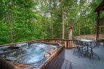 Hot tub next to the firepit for relaxing or celebrating